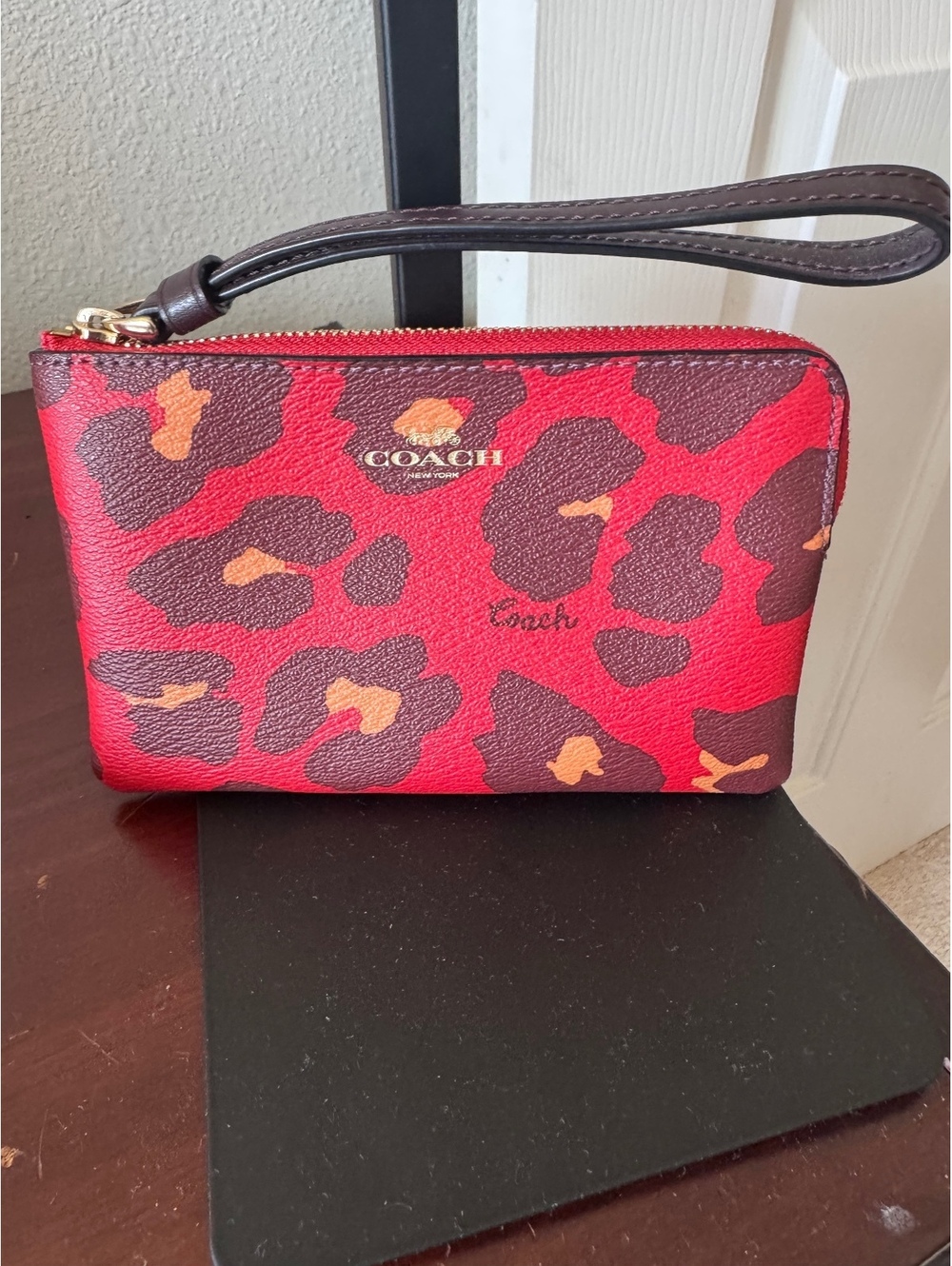 C6.1 Coach Corner Zip Wristlet with Leopard Print in Bright Poppy